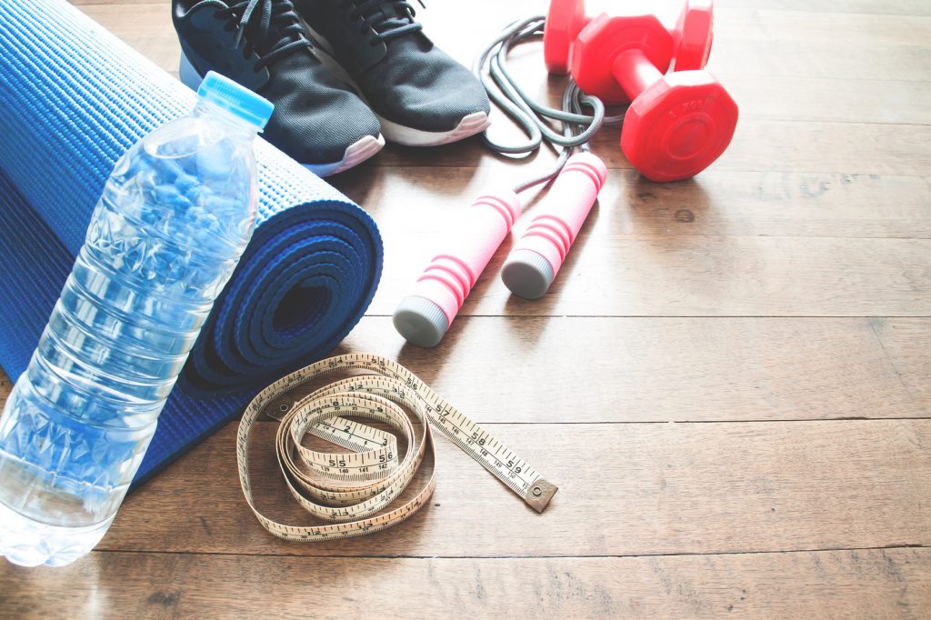 Sport equipments on wood floor, Working out concept