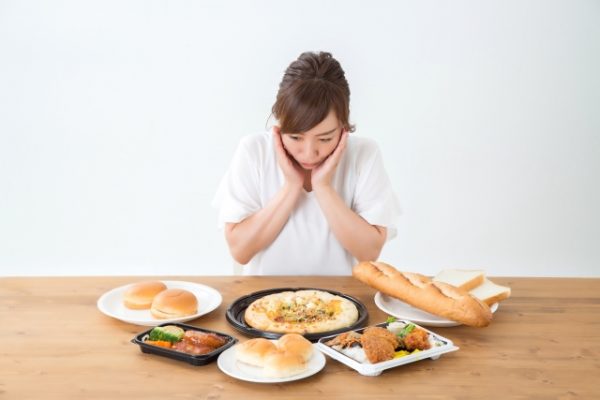 我慢する