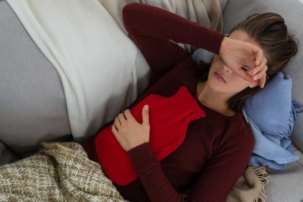 体調不良の女性