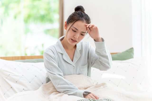 目覚めの悪い女性